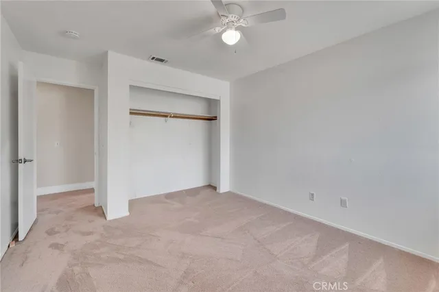 an empty room with a bathroom