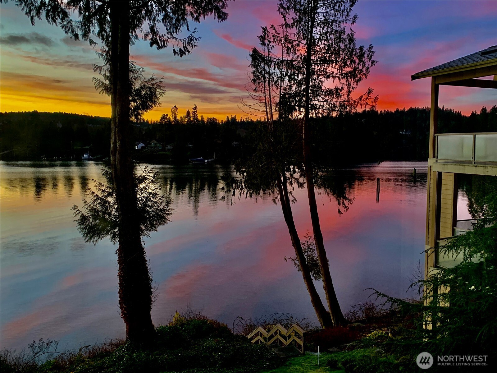221 North Bay Lane, Unit 2 Port Ludlow, WA 98365 - Photo 1 of 35 a picture of water with lots of palm trees