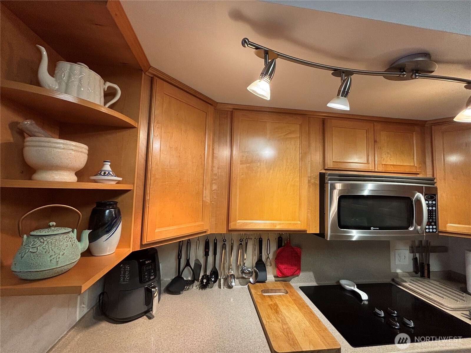 221 North Bay Lane, Unit 2 Port Ludlow, WA 98365 - Photo 15 of 35 a kitchen with a sink and a stove top oven