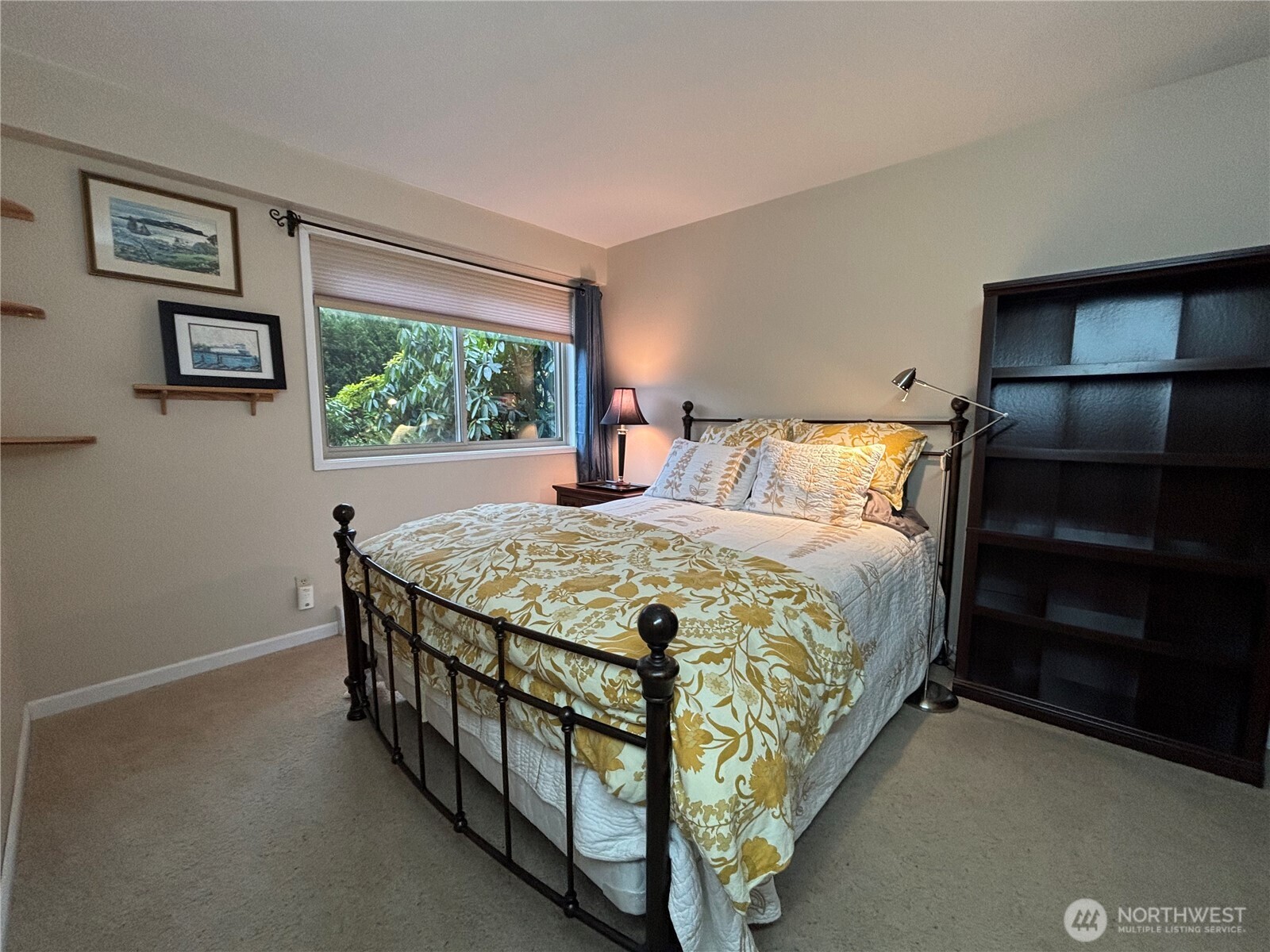 221 North Bay Lane, Unit 2 Port Ludlow, WA 98365 - Photo 28 of 35 a bedroom with a bed and a window
