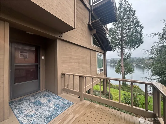 a view of a balcony with furniture