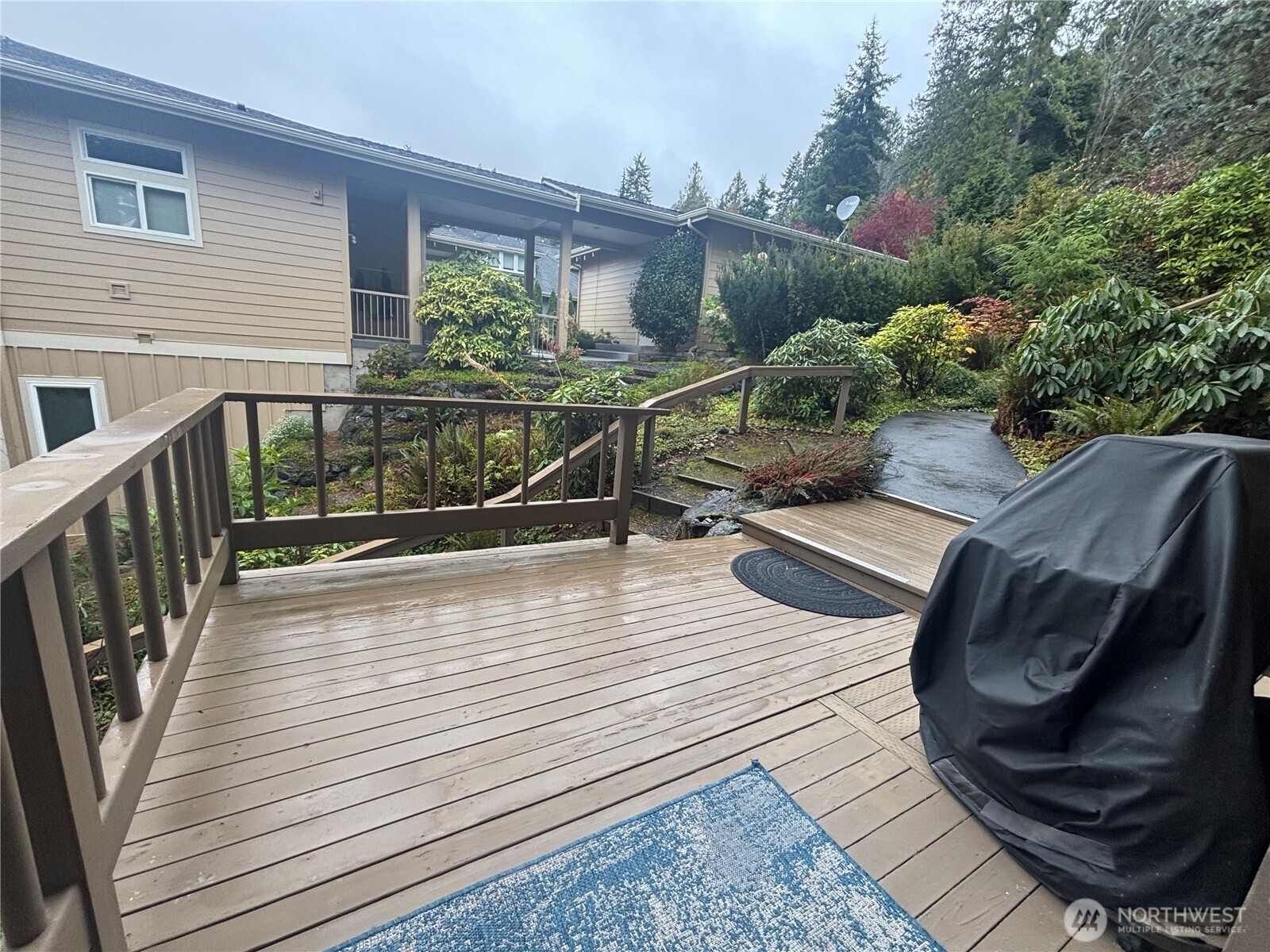 221 North Bay Lane, Unit 2 Port Ludlow, WA 98365 - Photo 4 of 35 a view of a balcony with furniture