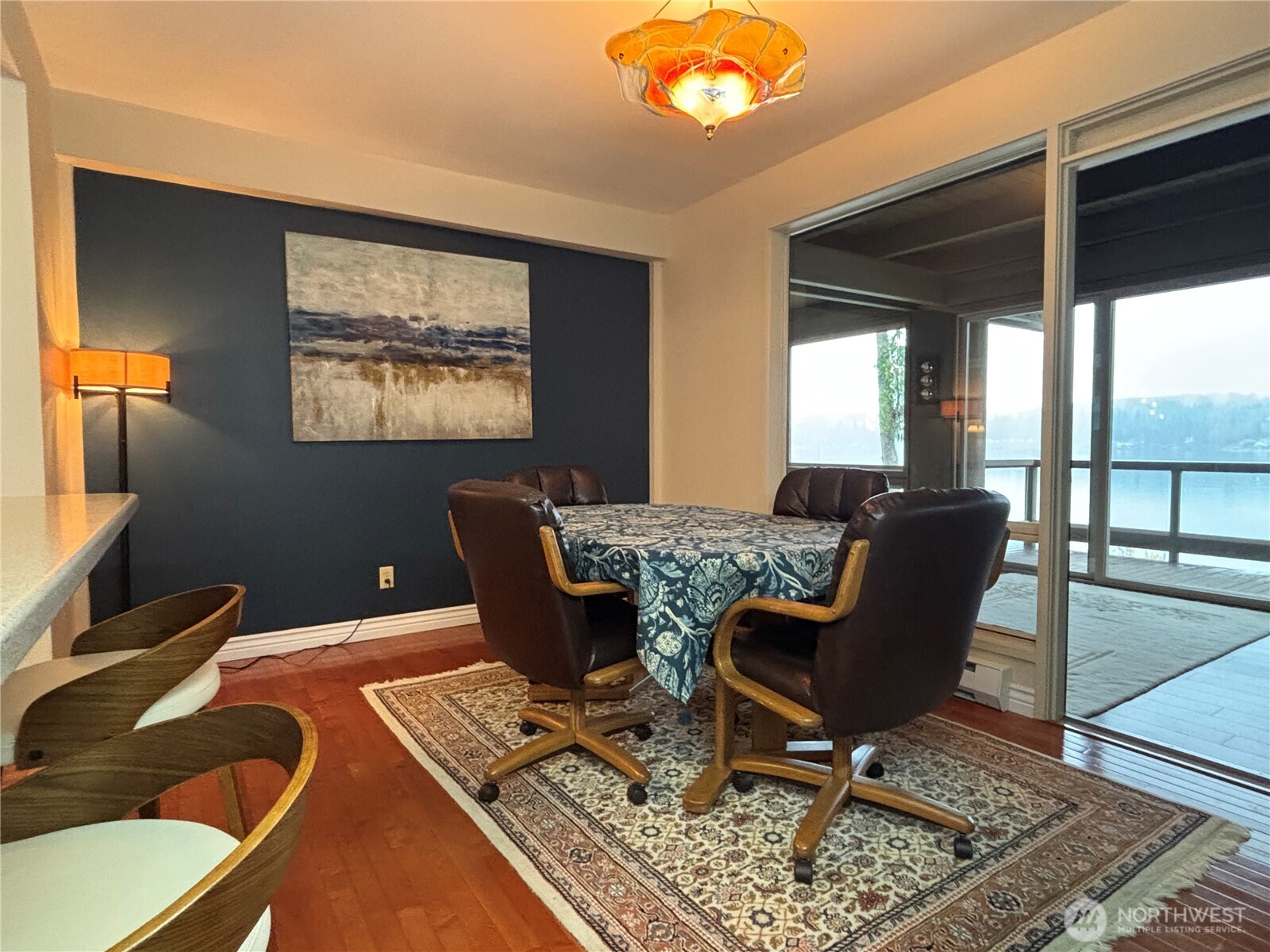 221 North Bay Lane, Unit 2 Port Ludlow, WA 98365 - Photo 10 of 35 a view of a dining room with furniture window and outside view