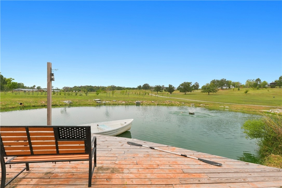 8800 Fred Austin Road Decatur, AR 72722 - Photo 47 of 60 Stocked pond with dock and small boat. Has