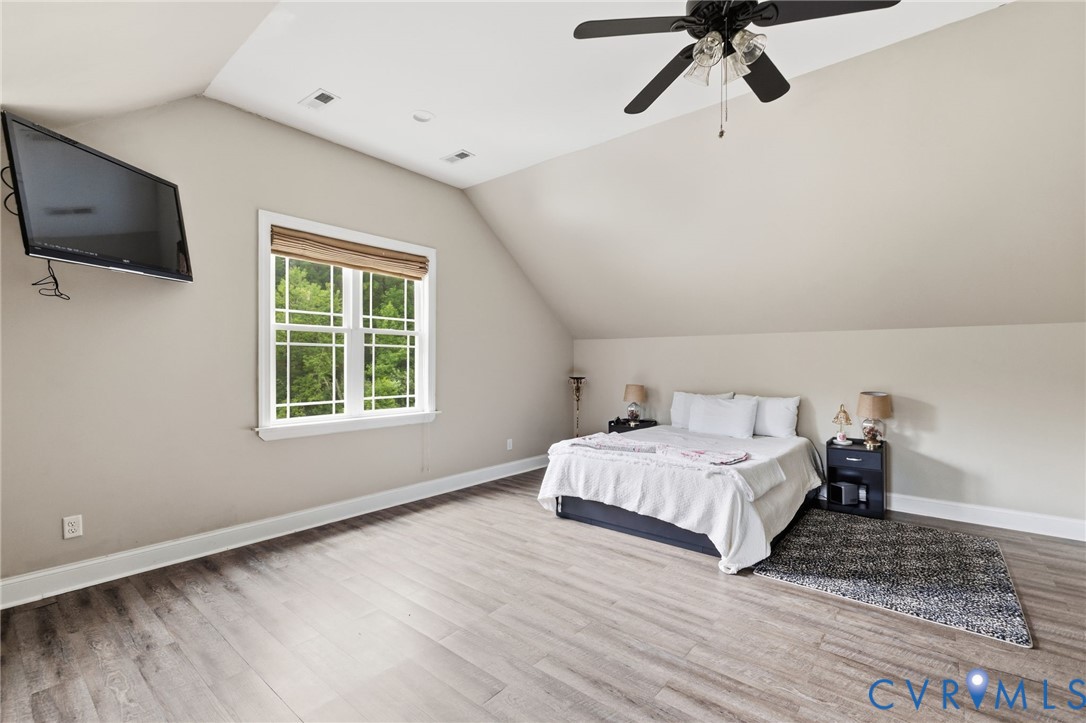 15220 River Road Chesterfield, VA 23838 - Photo 32 of 65 Spacious room featuring wood-finish flooring, a mu
