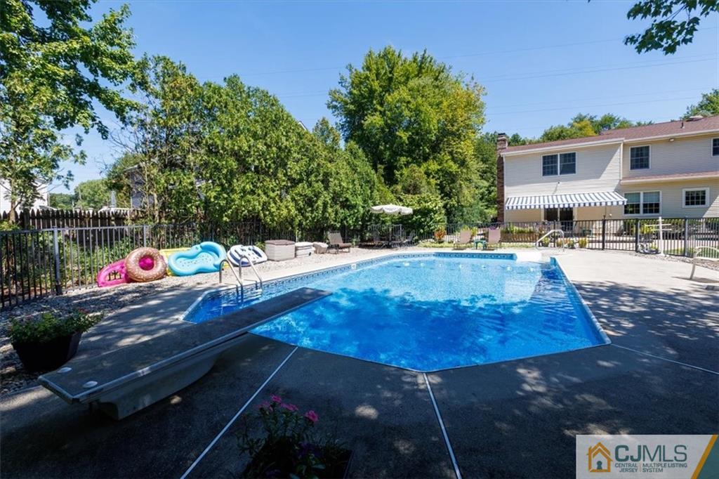 81 Spring Hill Road Old Bridge, NJ 07747 - Photo 13 of 40 a view of a backyard with sitting area