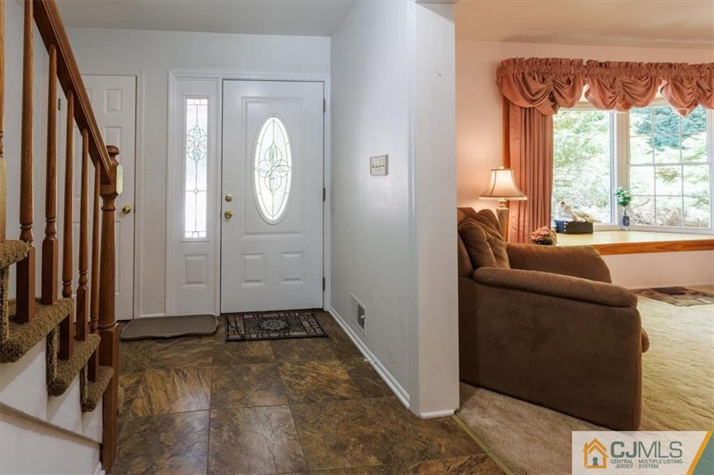 81 Spring Hill Road Old Bridge, NJ 07747 - Photo 15 of 40 a view of an entryway with wooden floor