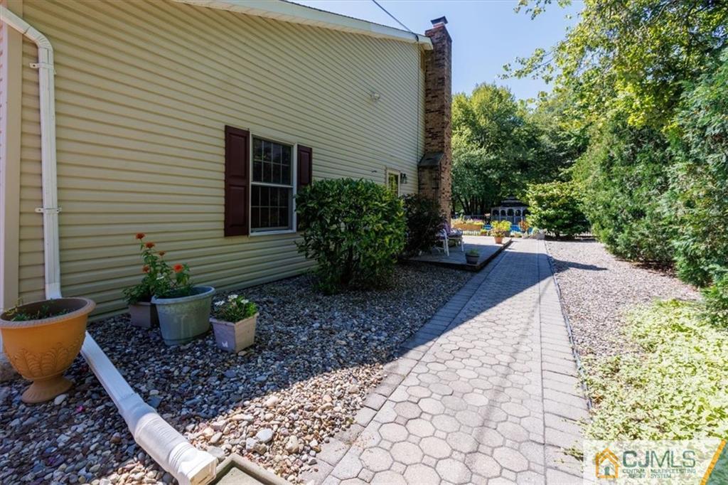 81 Spring Hill Road Old Bridge, NJ 07747 - Photo 3 of 40 a view of a backyard with sitting area
