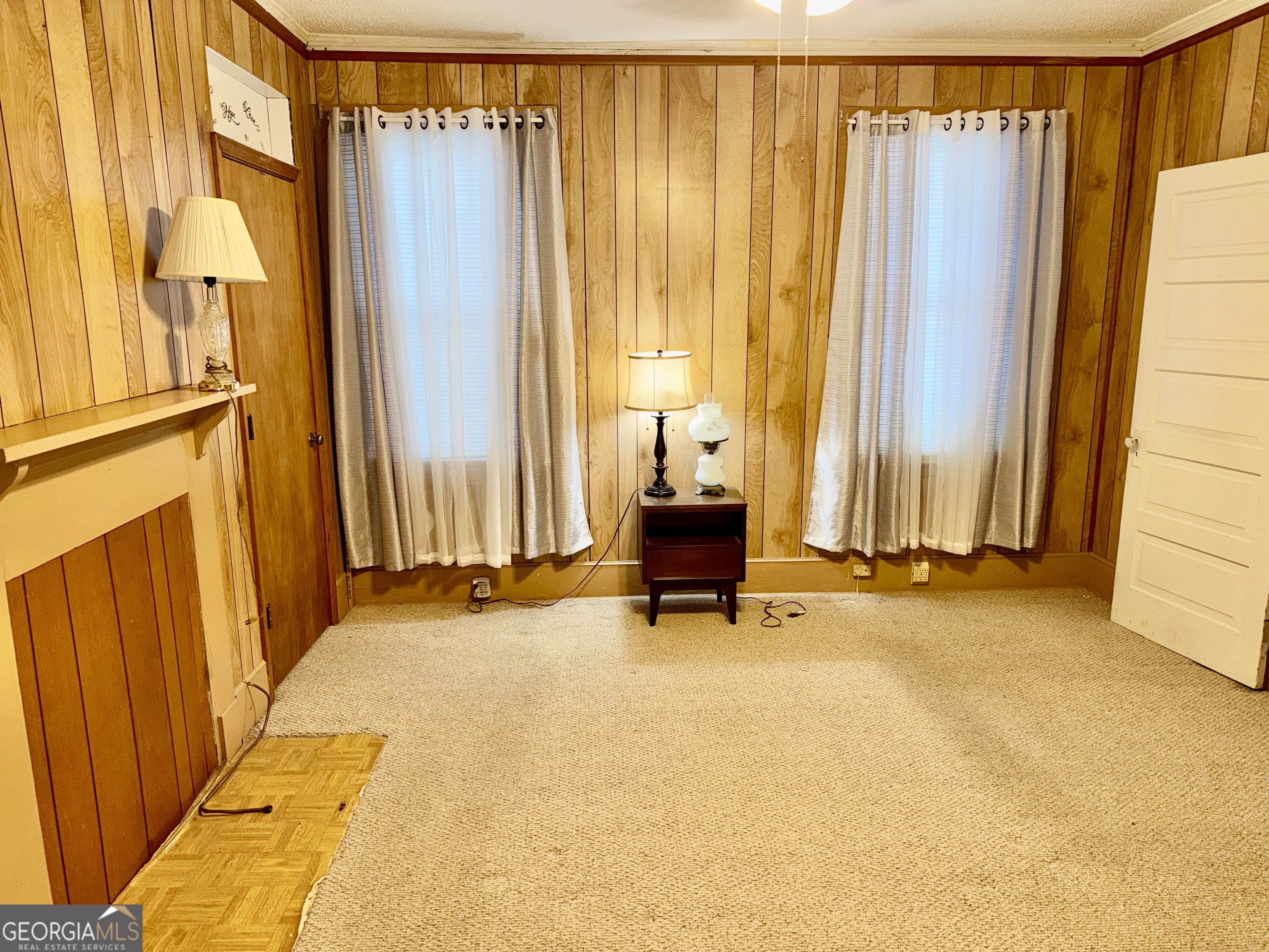 349 Cook Street Elberton, GA 30635 - Photo 11 of 22 a view of a bedroom with furniture and a window