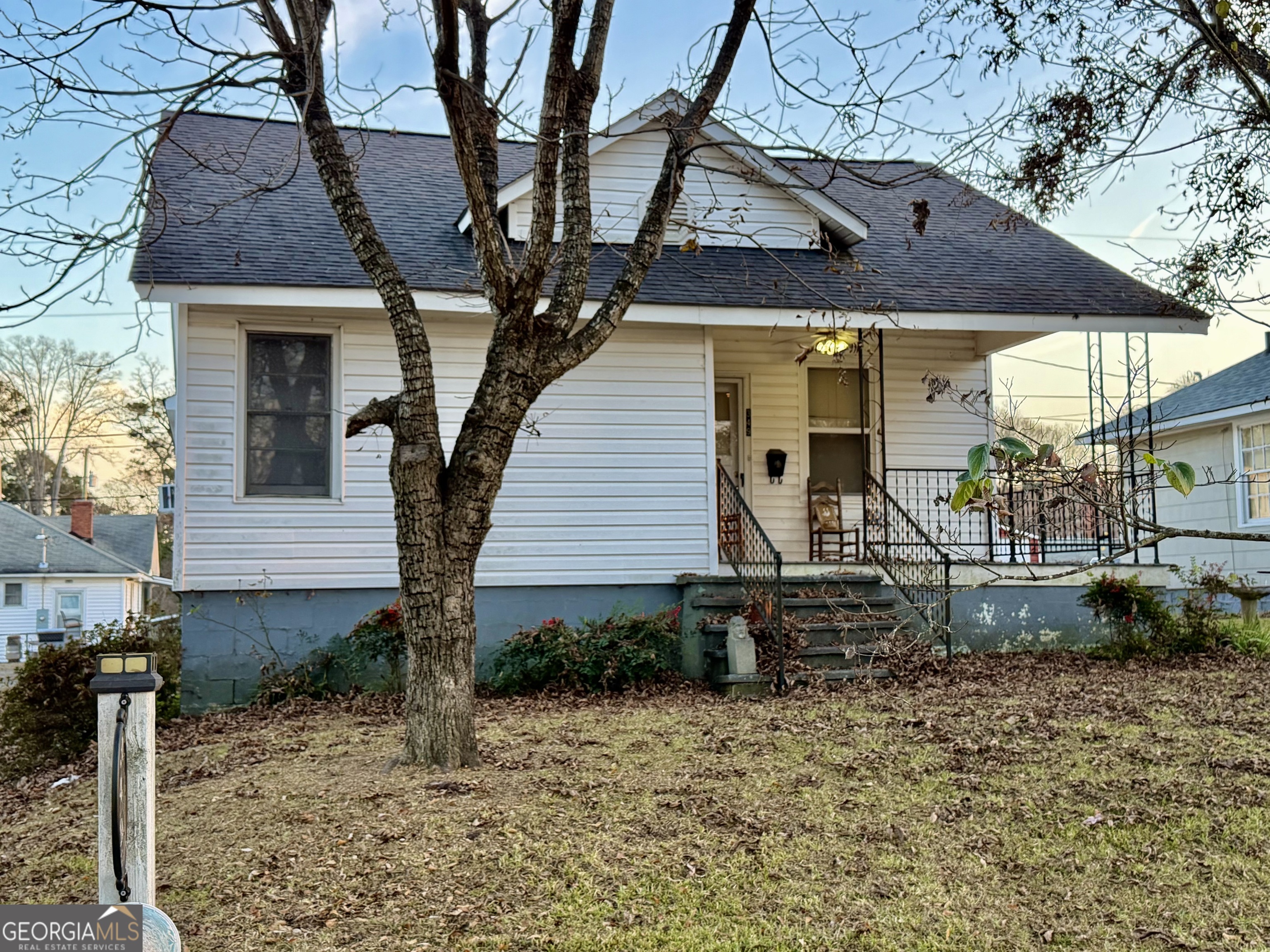 349 Cook Street Elberton, GA 30635 - Photo 3 of 22 a view of a house with a yard