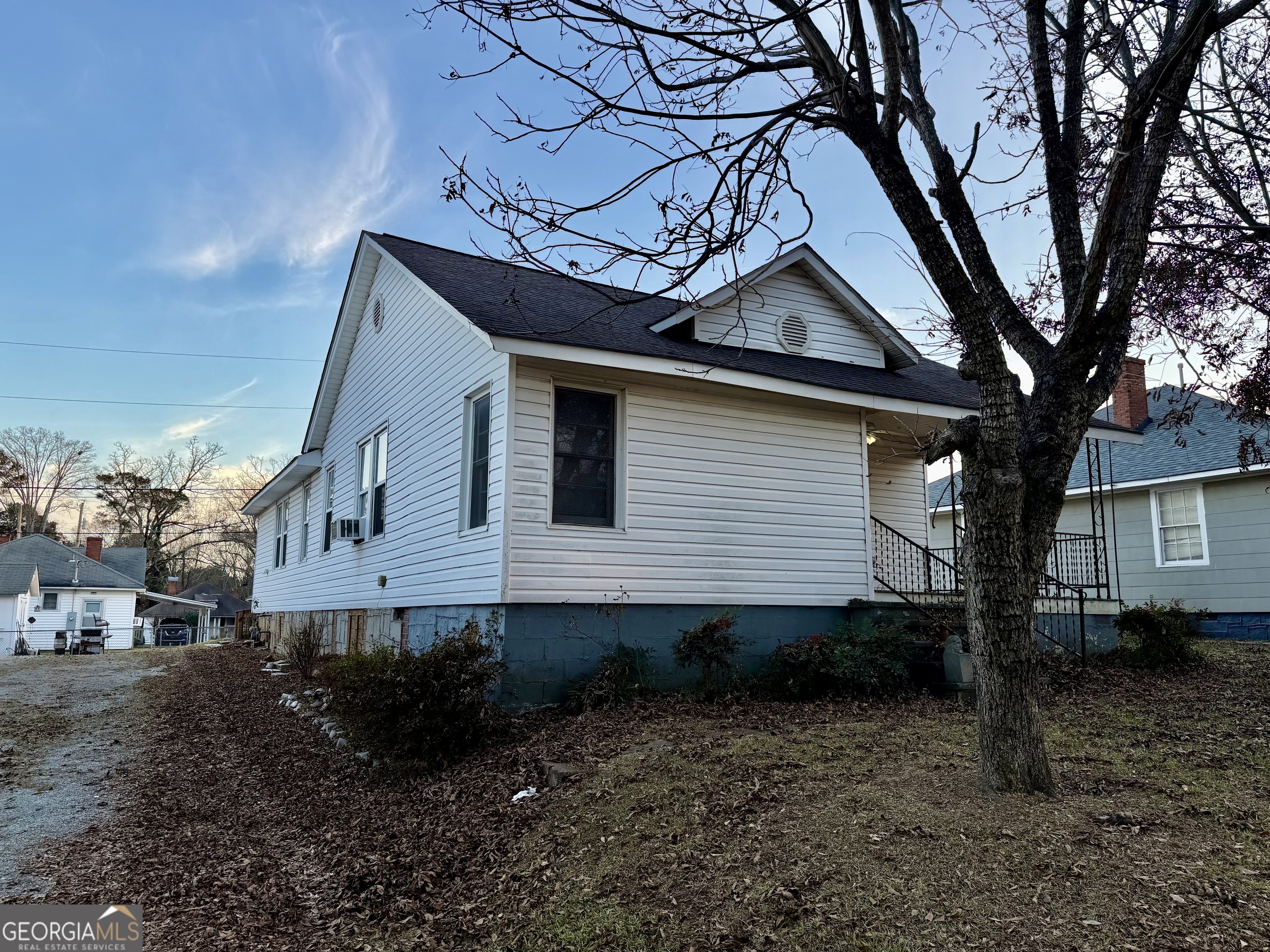 349 Cook Street Elberton, GA 30635 - Photo 4 of 22 a view of a house with a yard