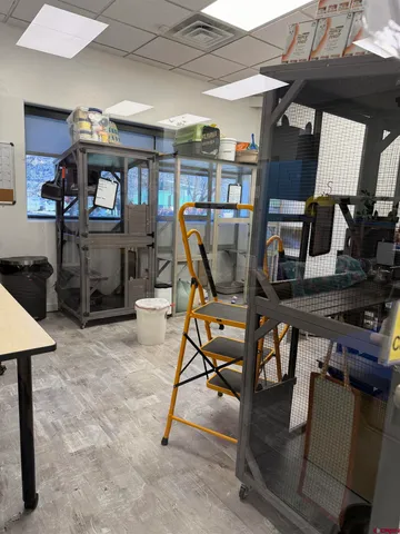 a room with lots of wooden furniture