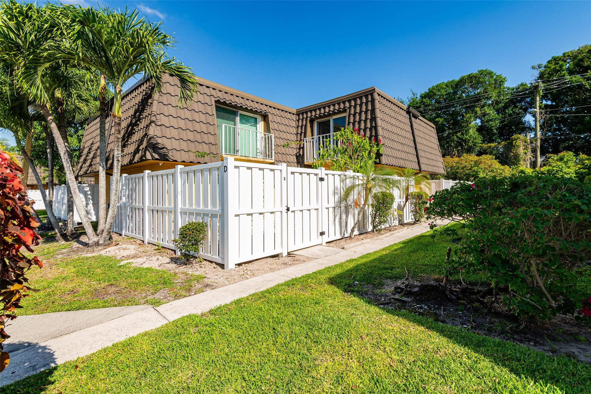 22208 Boca Rancho Drive, Unit D Boca Raton, FL 33428 - Photo 1 of 34 a view of backyard with green space