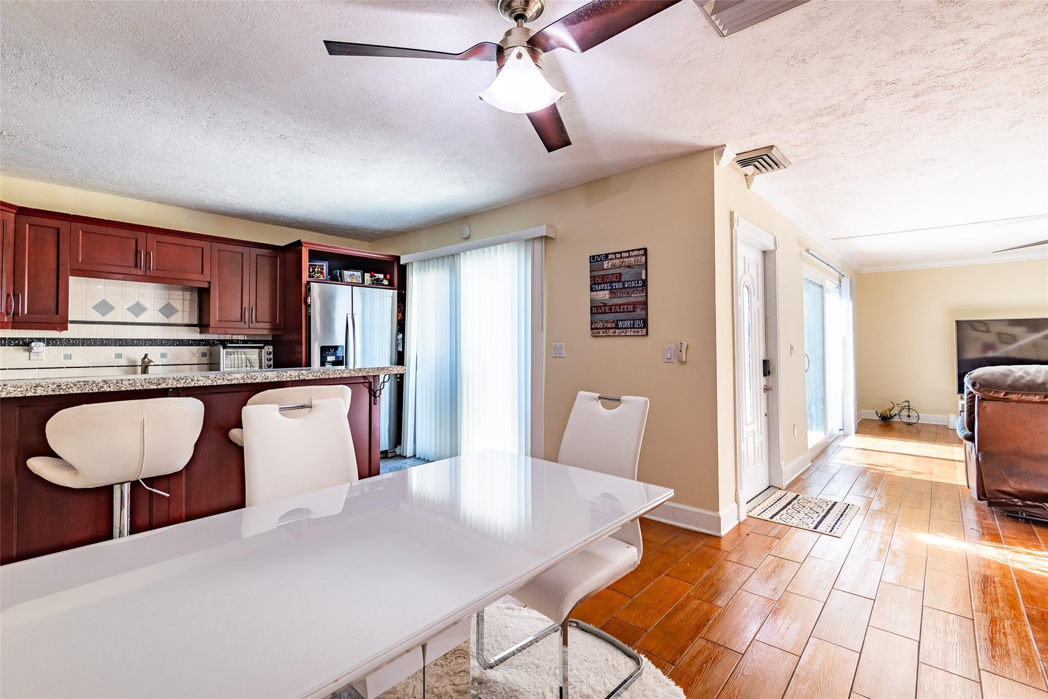 22208 Boca Rancho Drive, Unit D Boca Raton, FL 33428 - Photo 11 of 34 a living room with furniture and a wooden floor