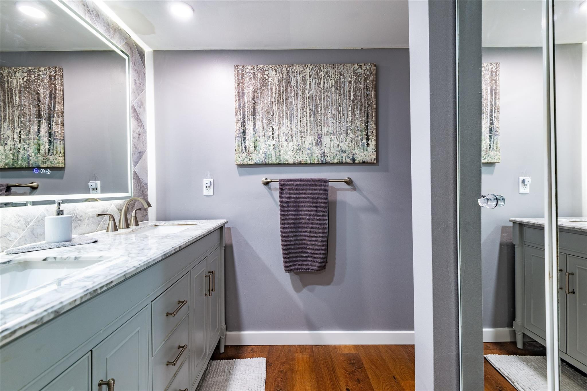 22208 Boca Rancho Drive, Unit D Boca Raton, FL 33428 - Photo 23 of 34 a bathroom with a sink and a mirror