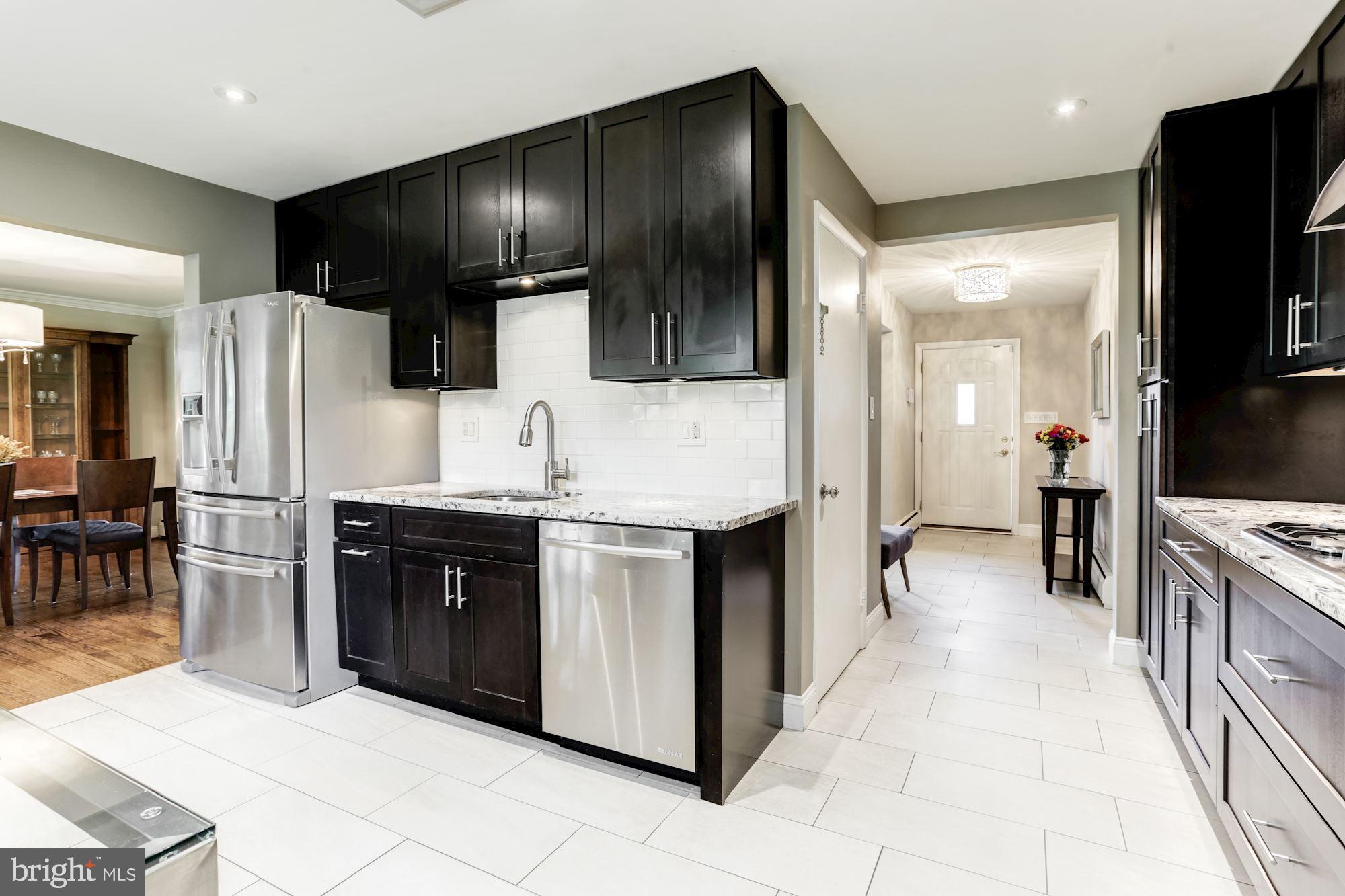 3941 Hawthorne Road Ellicott City, MD 21042 - Photo 11 of 37 Gourmet Eat-In Kitchen | Granite Countertops