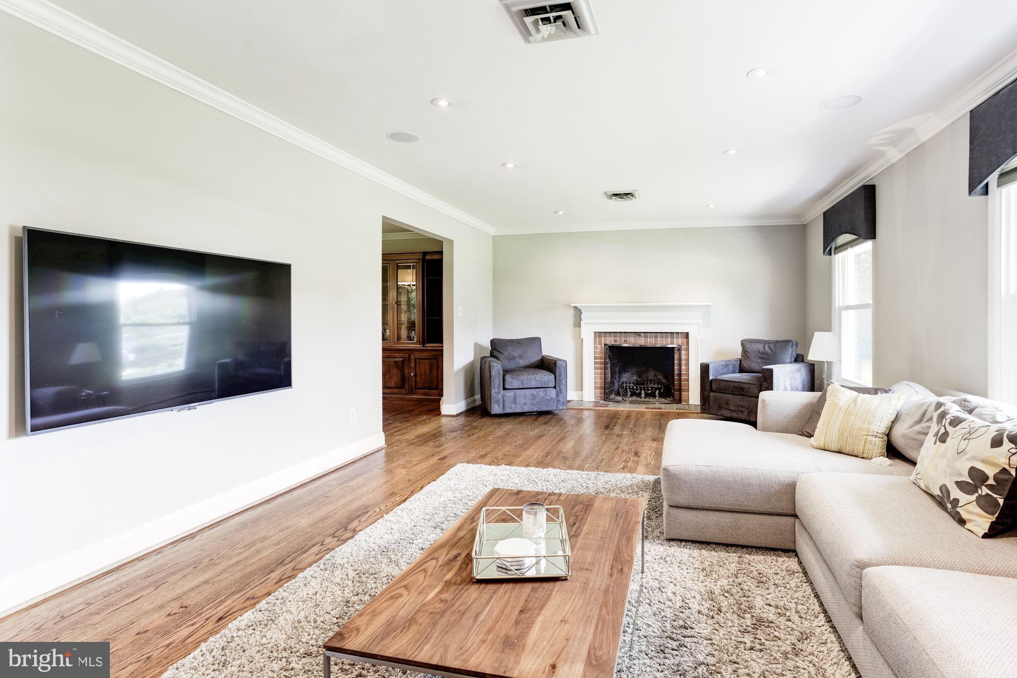 3941 Hawthorne Road Ellicott City, MD 21042 - Photo 4 of 37 Living Room | Hardwood Floors | Fireplace