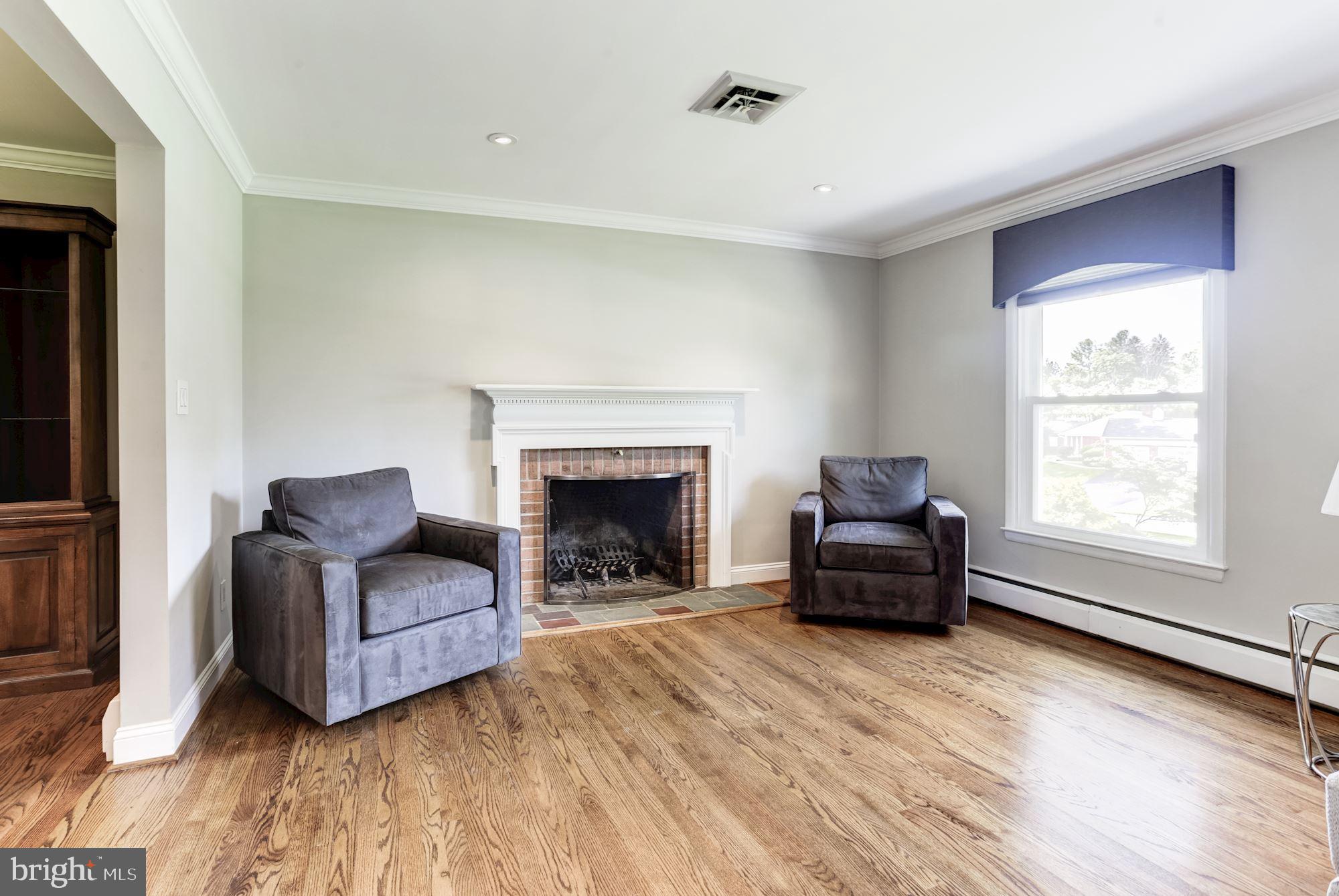 3941 Hawthorne Road Ellicott City, MD 21042 - Photo 6 of 37 Living Room | Hardwood Floors | Fireplace