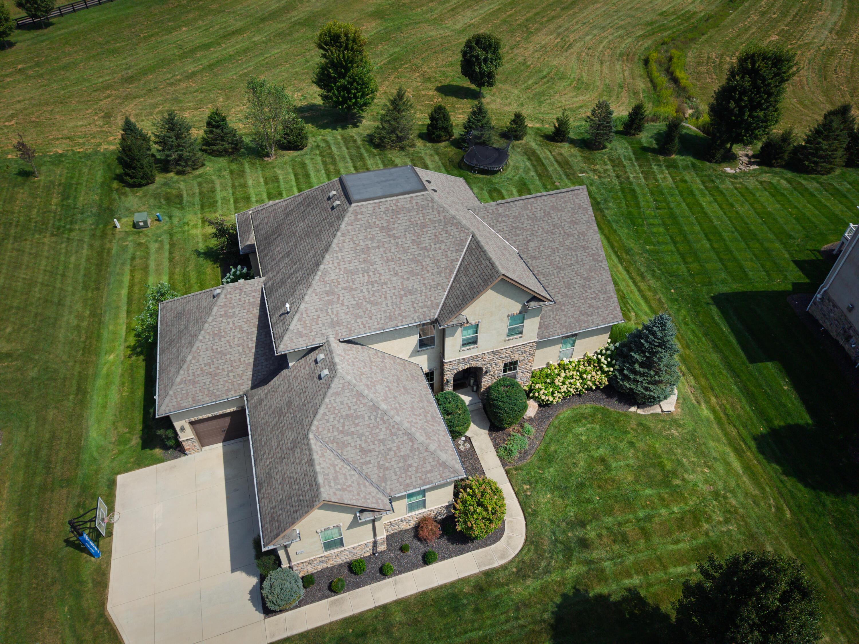 1404 Guilford Road Delaware, OH 43015 - Photo 2 of 33 DJI_20260902133310_0002_D