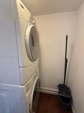 a front view of multi story residential apartment building with a yard