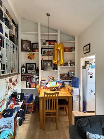 a kitchen with a stove and a window