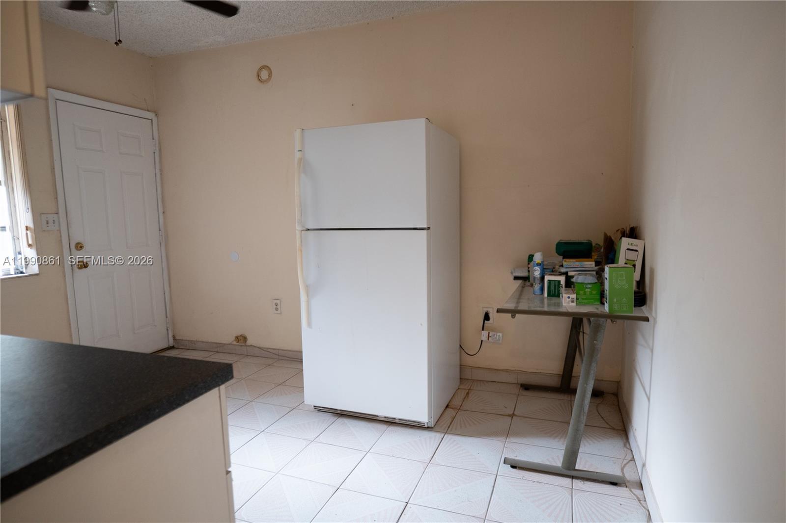 2323 Southwest 17th Terrace Miami, FL 33145 - Photo 12 of 24 a hallway with storage and utility
