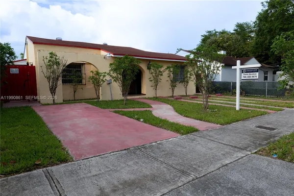 a view of a backyard with a garden