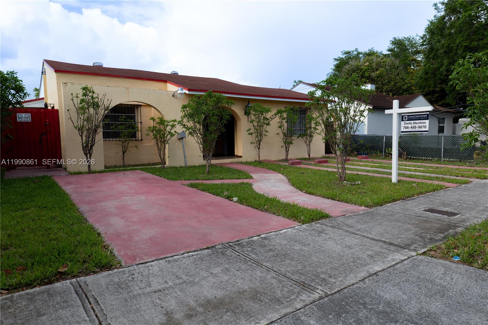 2323 Southwest 17th Terrace Miami, FL 33145 - Photo 2 of 24 a view of a backyard with a garden