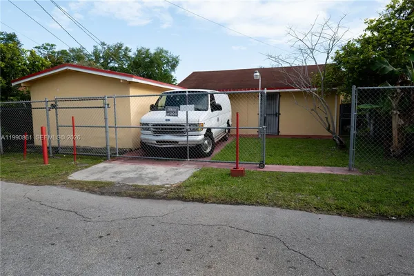 a house view with a garden space