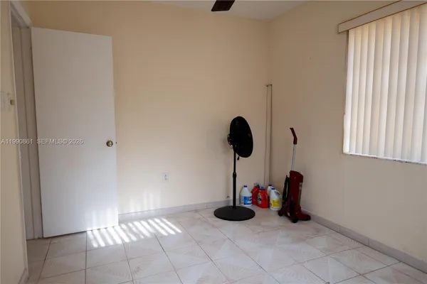 a view of a room with a window