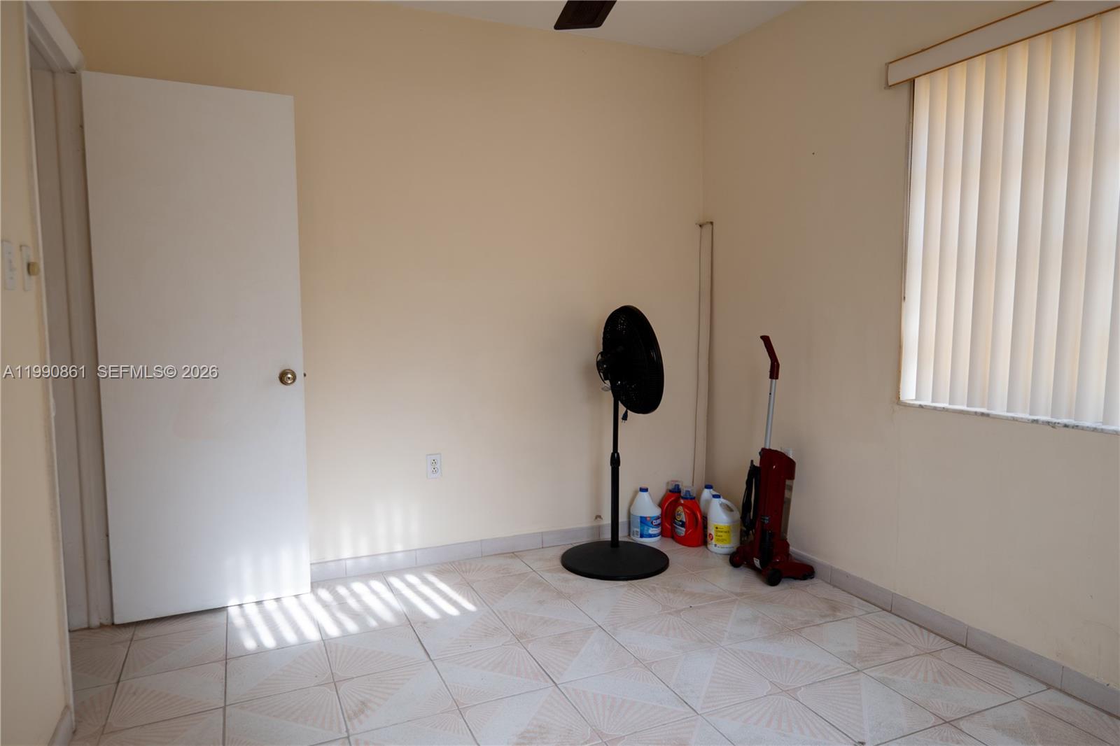 2323 Southwest 17th Terrace Miami, FL 33145 - Photo 10 of 24 a view of a room with a window