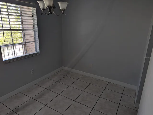 a close view of stove top oven and cabinets