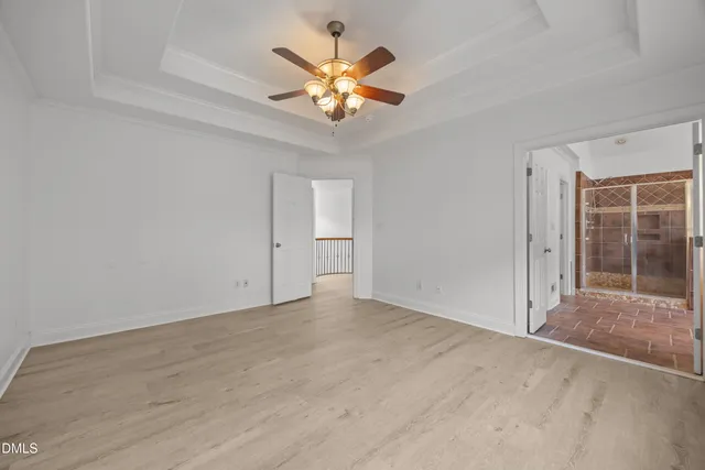 a bathroom with a tub and a shower