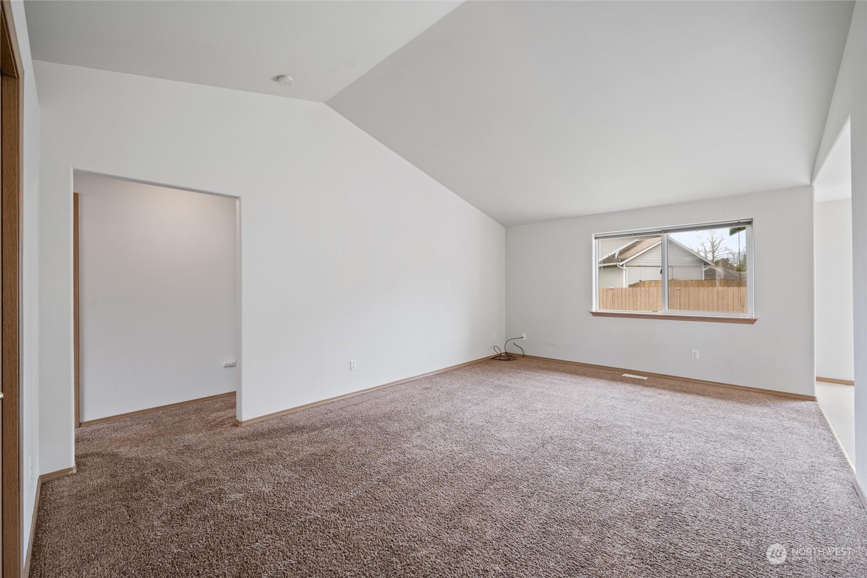422 Spring Lane Sedro-Woolley, WA 98284 - Photo 2 of 25 an empty room with windows and closet