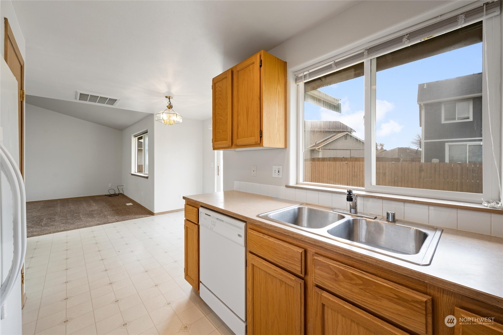 422 Spring Lane Sedro-Woolley, WA 98284 - Photo 8 of 25 a kitchen with a sink and a window