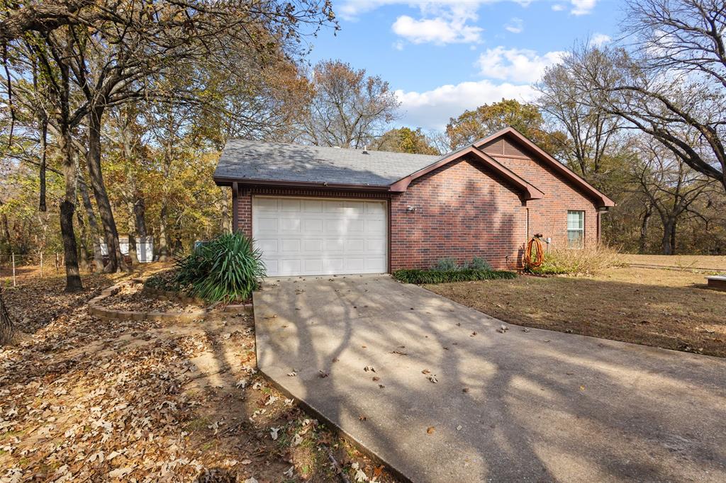 80 Campbell Road Sadler, TX 76264 - Photo 26 of 29 Side entry garage