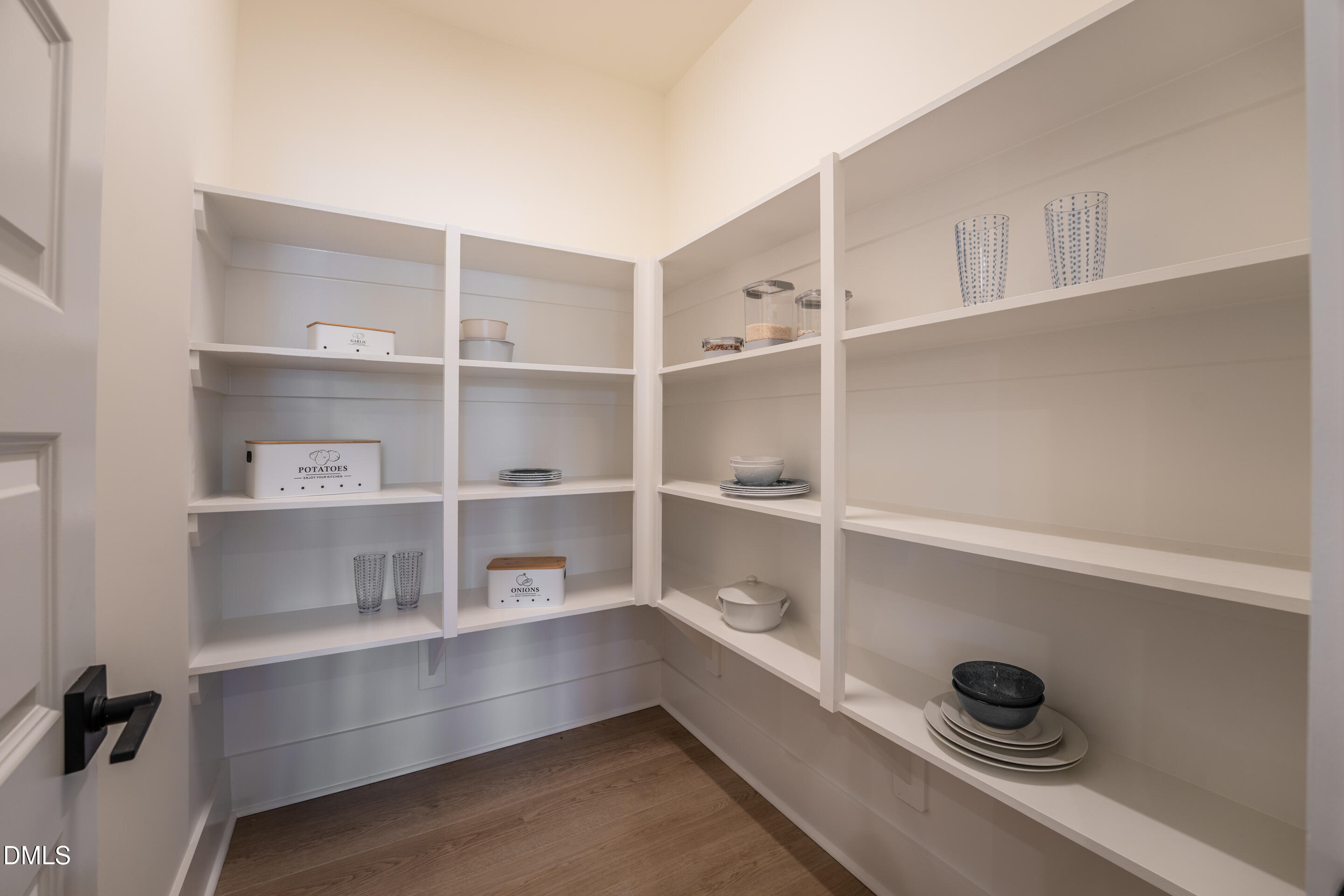 415 Heidi May Way Carthage, NC 28327 - Photo 12 of 48 a room with a wooden floor and shelf