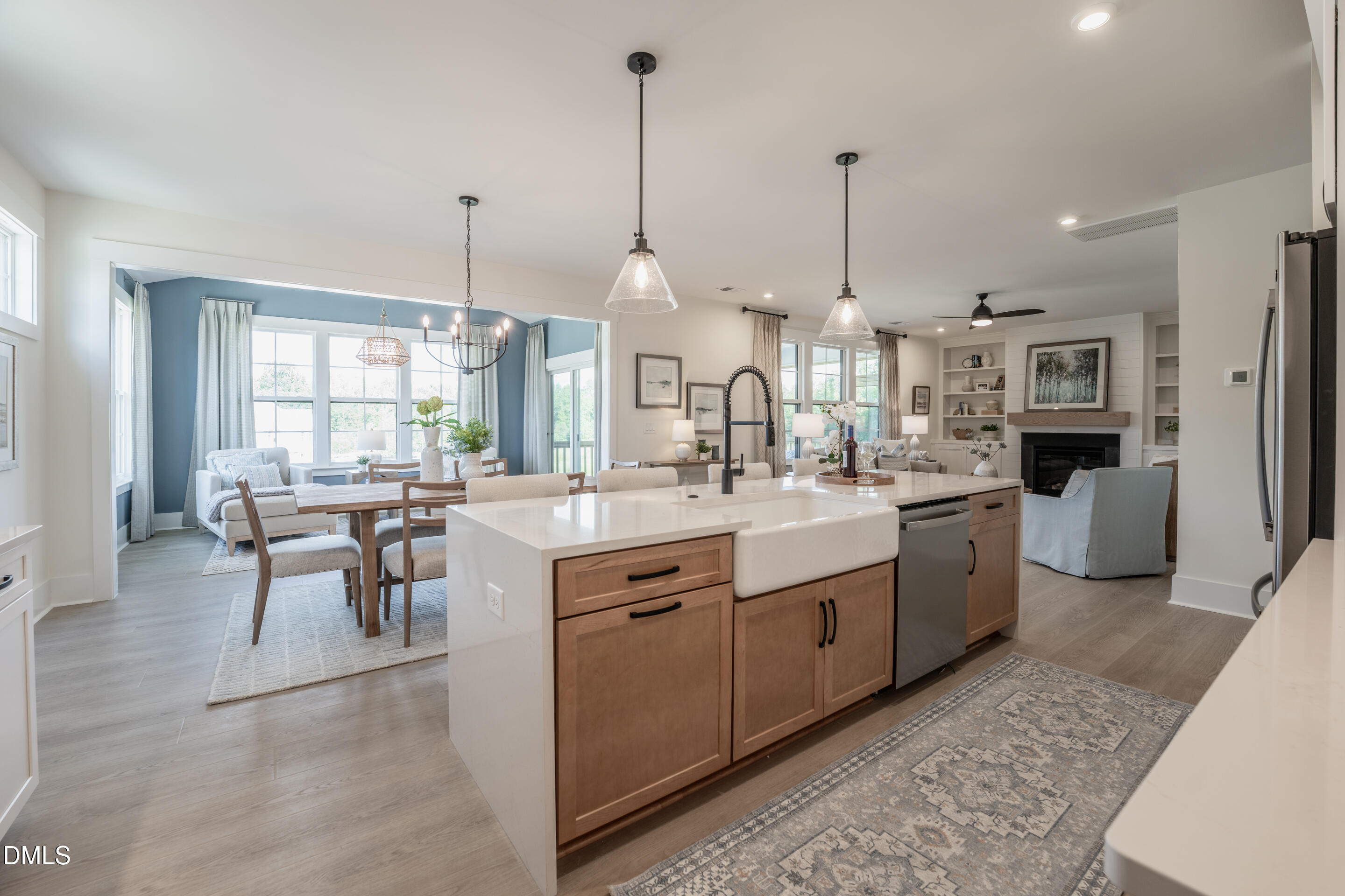 415 Heidi May Way Carthage, NC 28327 - Photo 13 of 48 a large kitchen with kitchen island a sink table and chairs