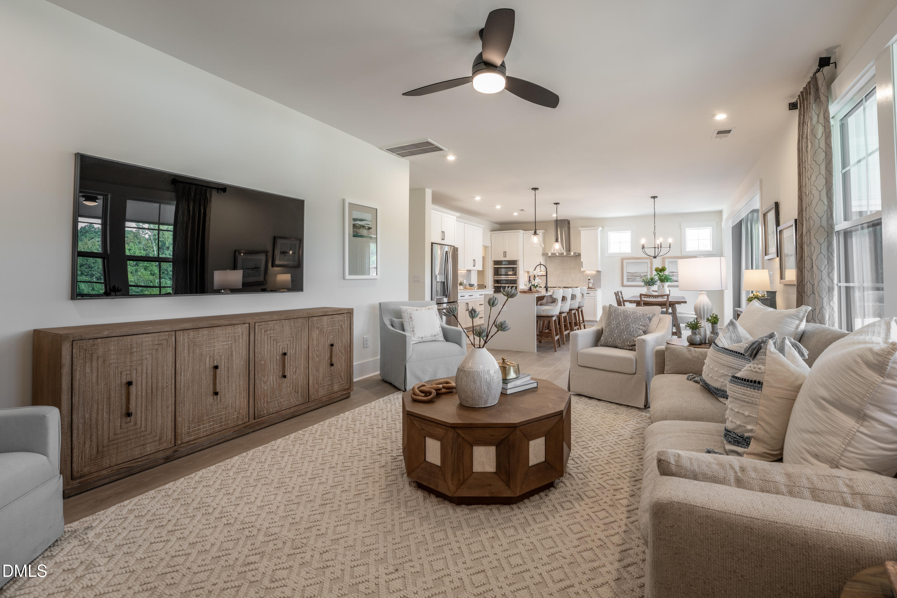 415 Heidi May Way Carthage, NC 28327 - Photo 20 of 48 a living room with furniture and a flat screen tv