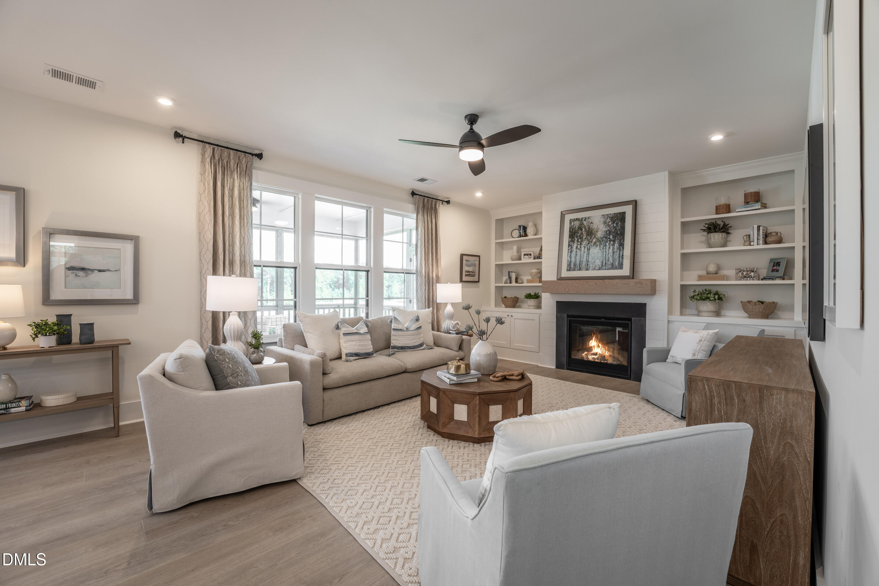 415 Heidi May Way Carthage, NC 28327 - Photo 22 of 48 a living room with furniture and a fireplace
