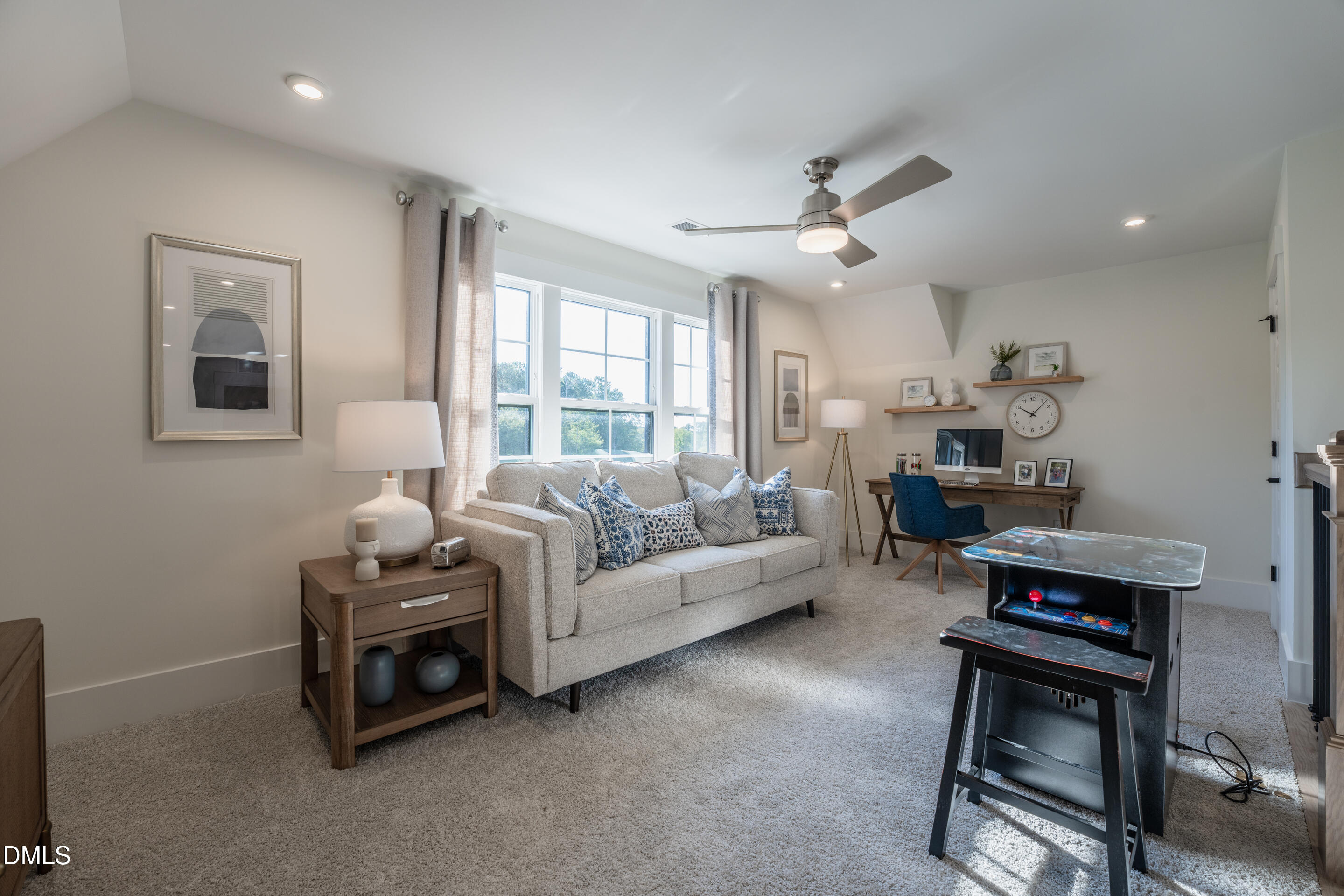 415 Heidi May Way Carthage, NC 28327 - Photo 24 of 48 a living room with furniture a ceiling fan and a window