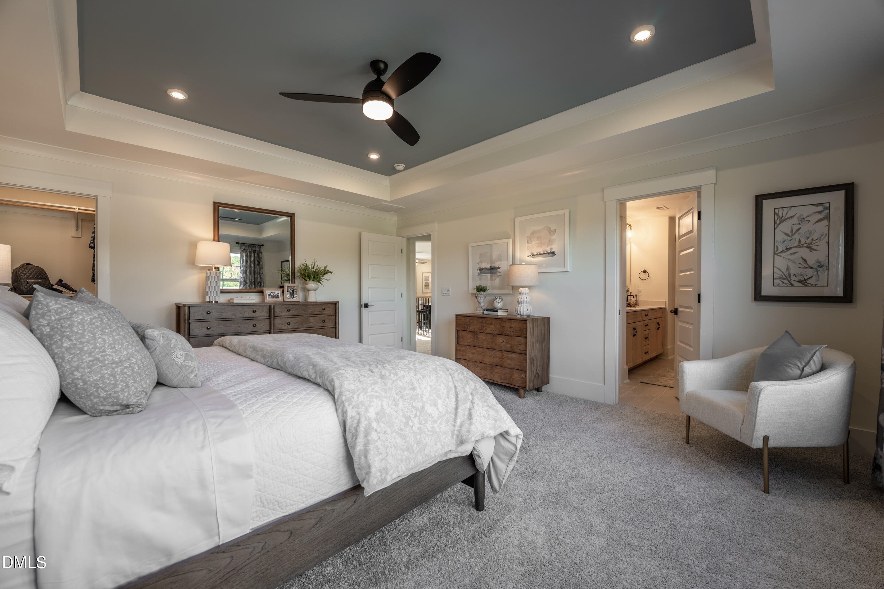 415 Heidi May Way Carthage, NC 28327 - Photo 34 of 48 a spacious bedroom with a bed and ceiling fan