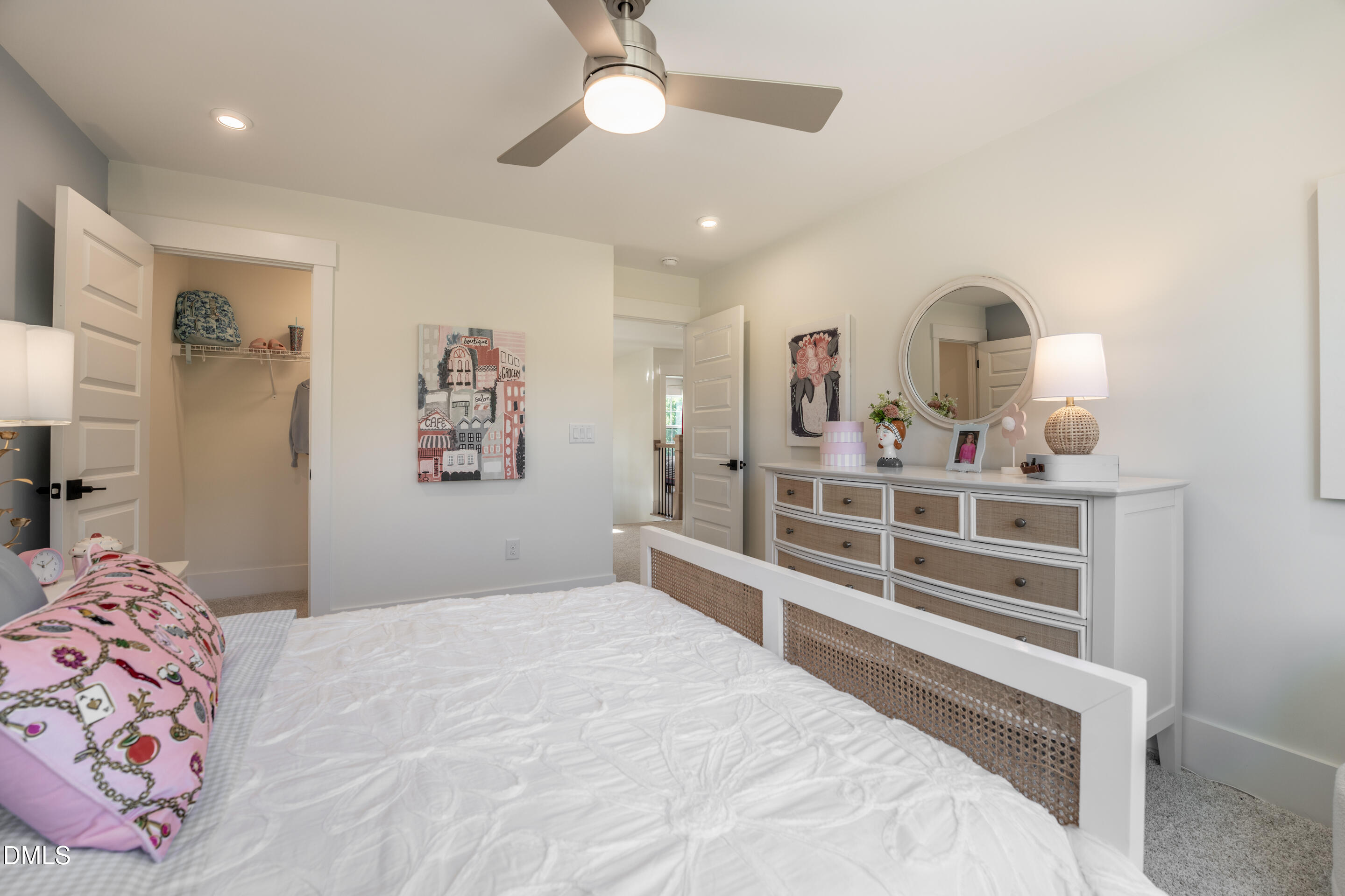415 Heidi May Way Carthage, NC 28327 - Photo 37 of 48 a bedroom with a bed and a chandelier