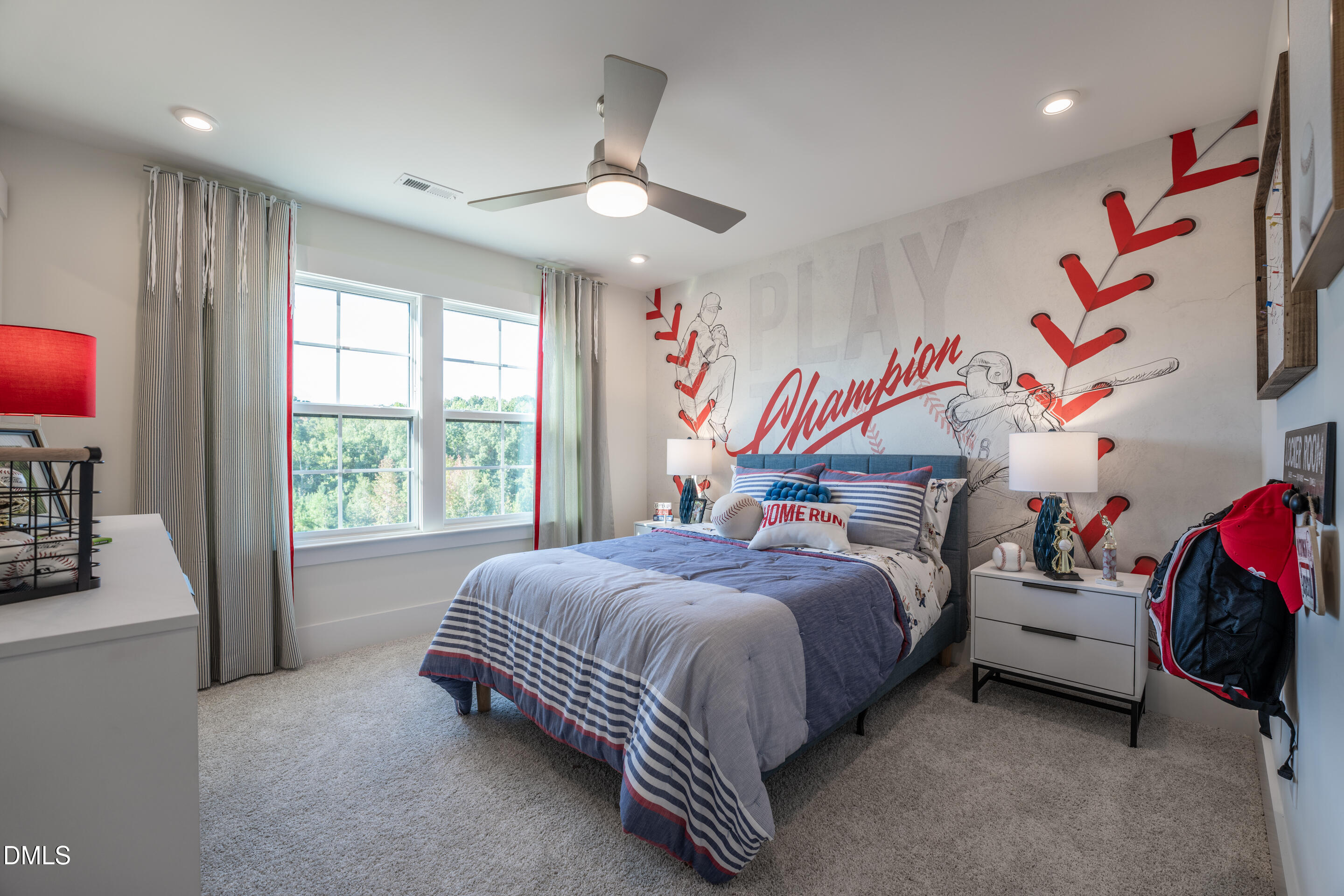 415 Heidi May Way Carthage, NC 28327 - Photo 39 of 48 a bedroom with bed and a chandelier