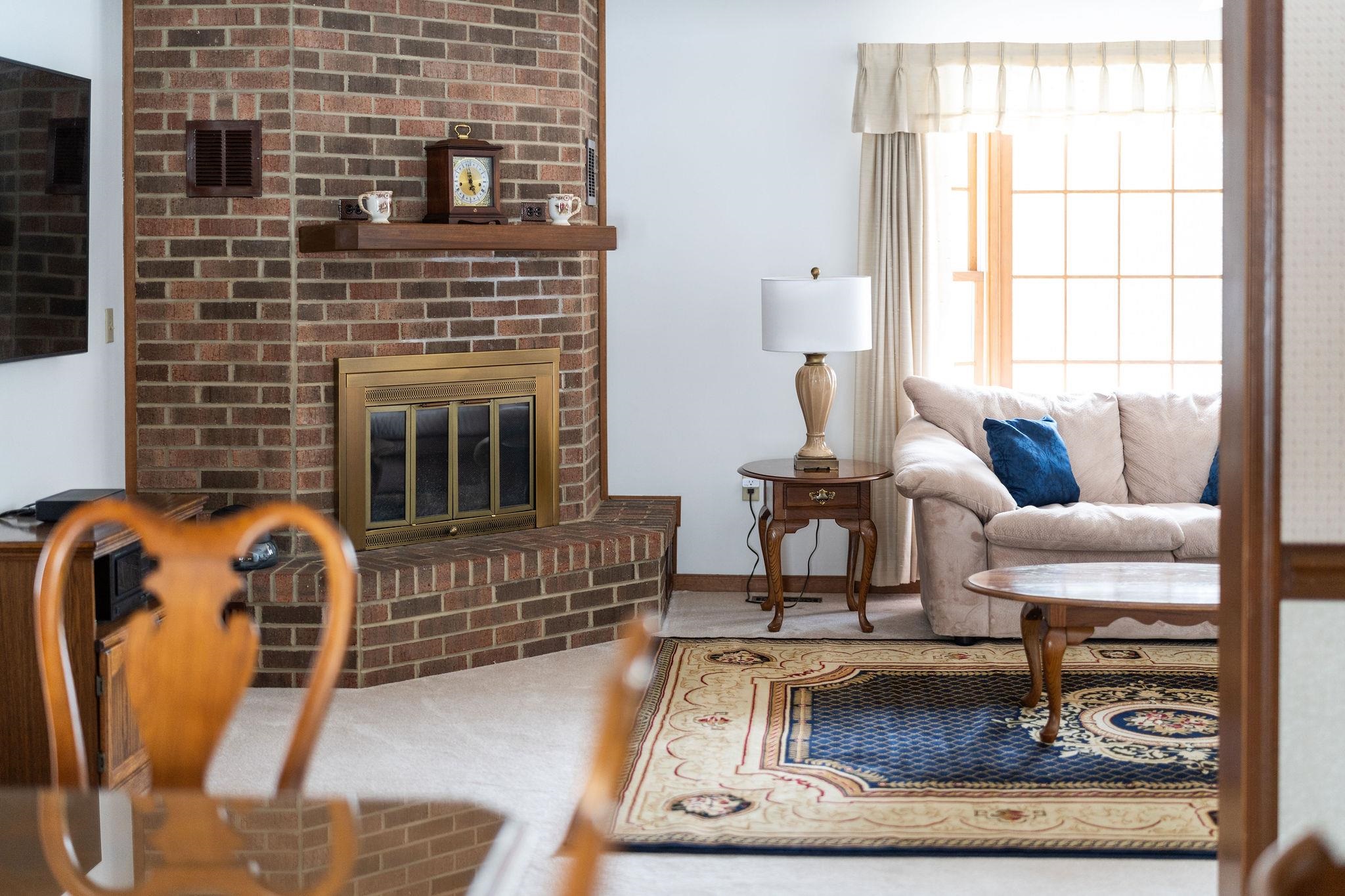298 George Home Road Waynesboro, VA 22980 - Photo 6 of 59 a living room with furniture and a fireplace
