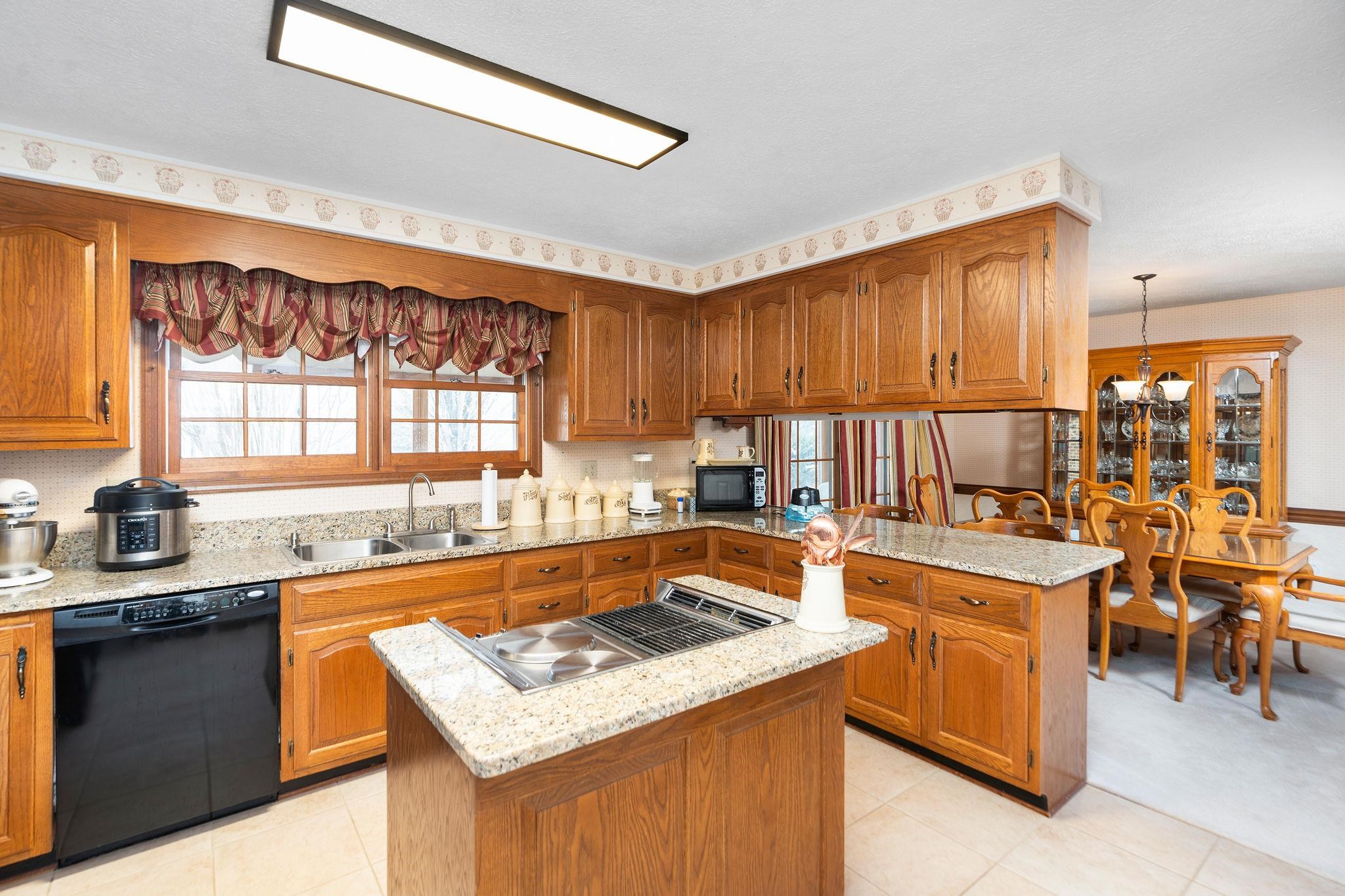 298 George Home Road Waynesboro, VA 22980 - Photo 8 of 59 a kitchen with a stove a sink and a refrigerator