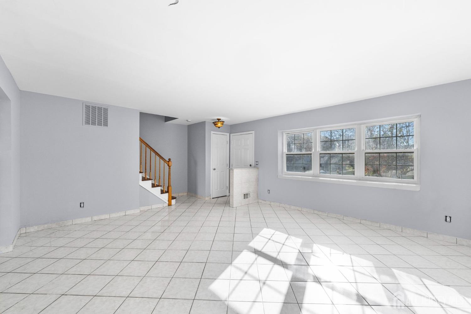 130 Pendleton Place Old Bridge, NJ 08857 - Photo 5 of 21 a view of an empty room with a window