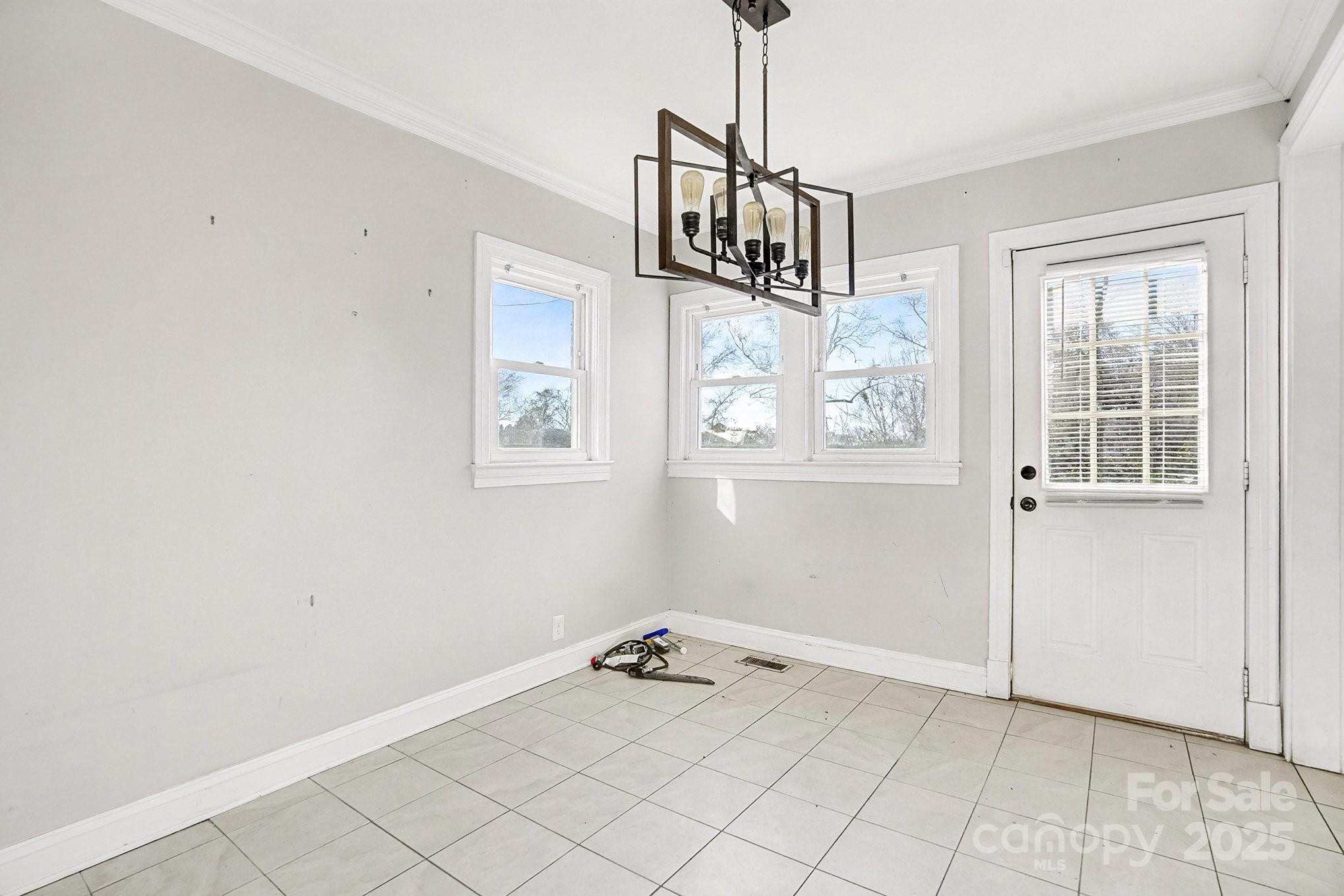 406 South Catawba Street Lancaster, SC 29720 - Photo 13 of 35 a view of an empty room with a window