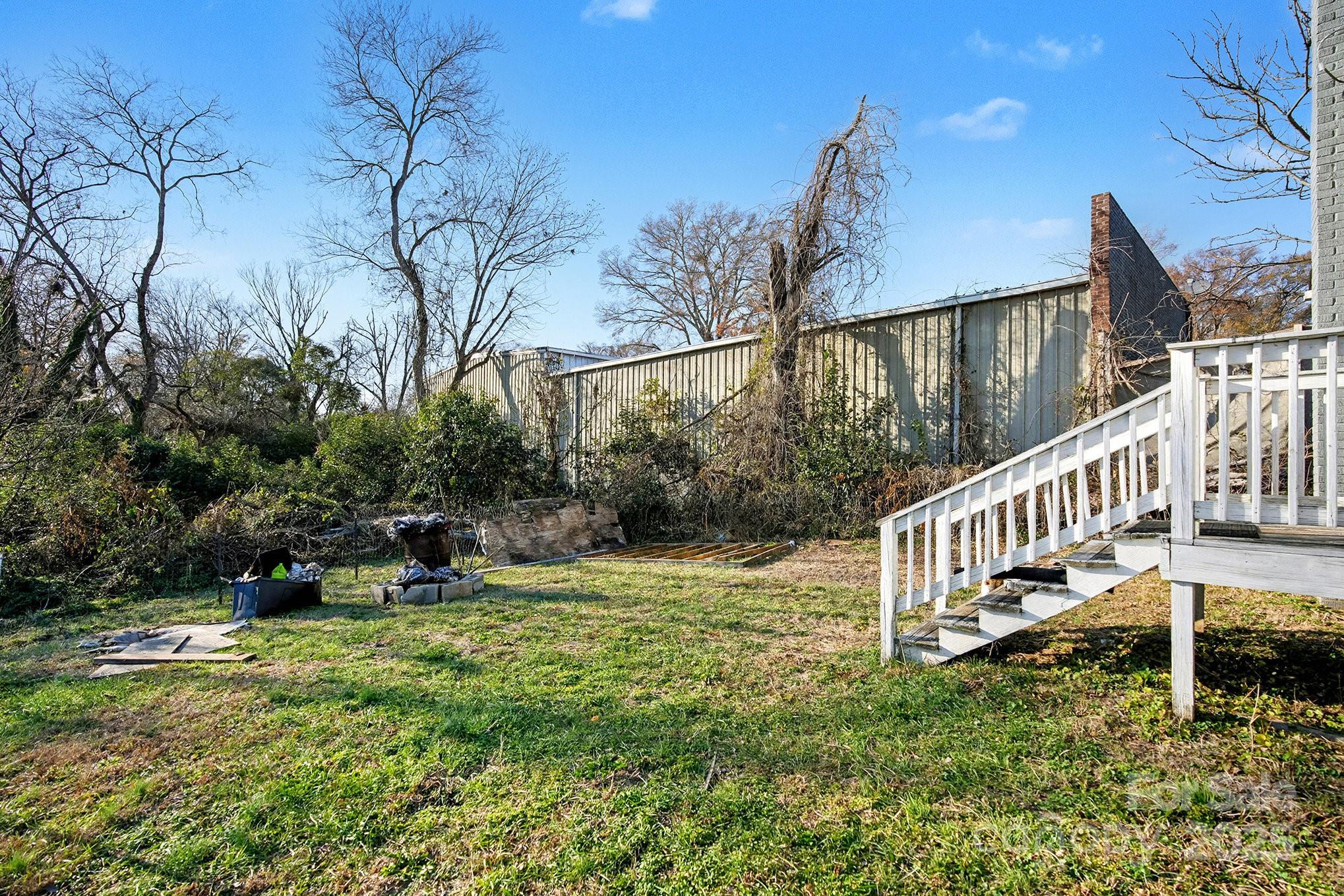 406 South Catawba Street Lancaster, SC 29720 - Photo 34 of 35 a view of a house with backyard and trees