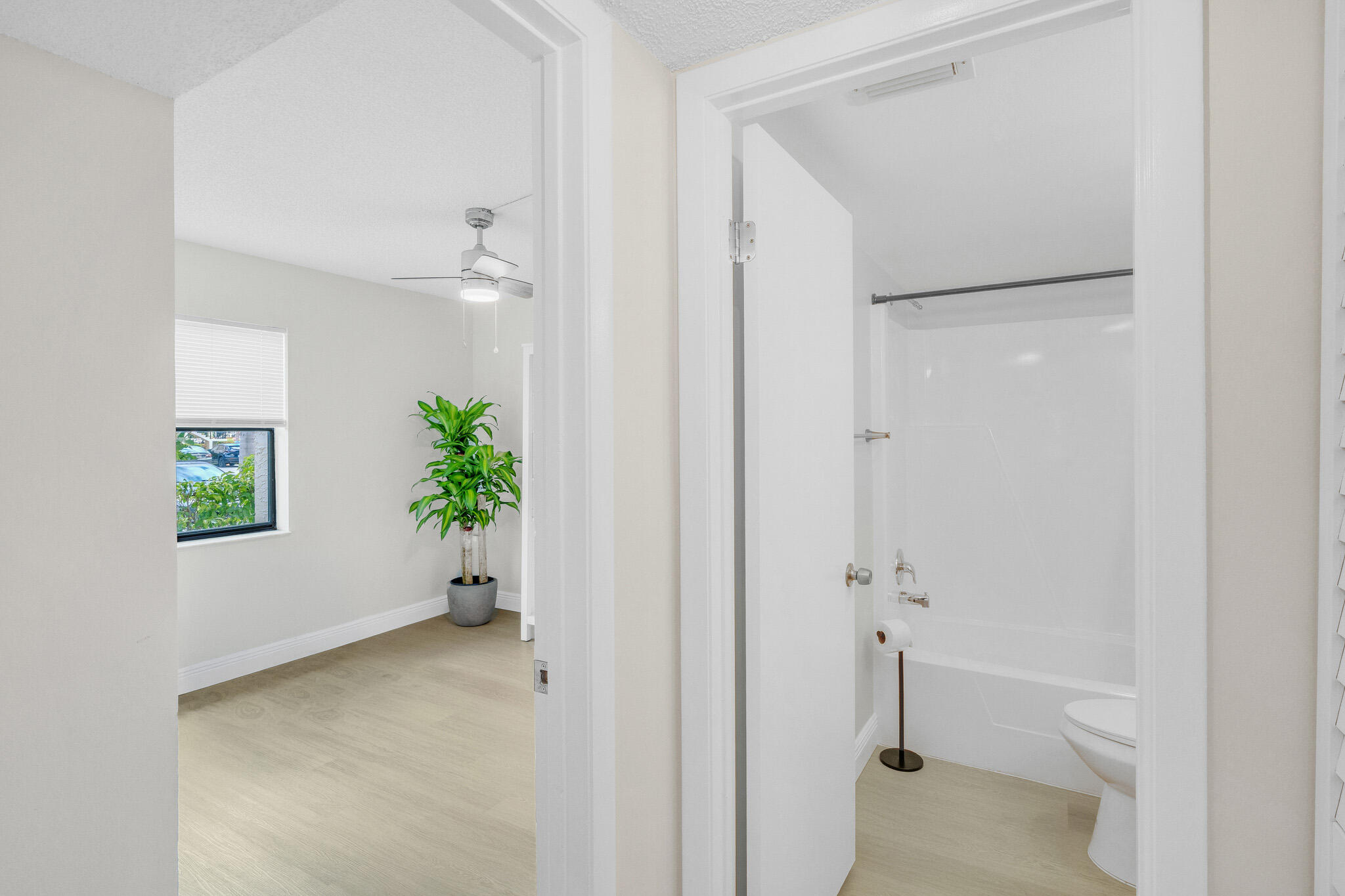 22136 Palms Way, Unit 103 Boca Raton, FL 33433 - Photo 29 of 42 a view of a bathroom with a potted plant